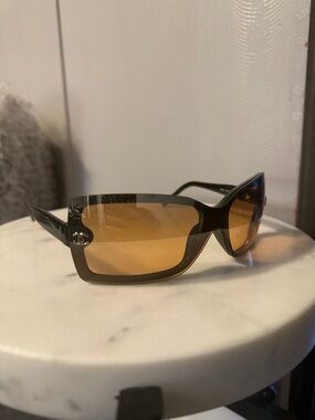 CHANEL Black Frame Sunglasses with Amber Lenses